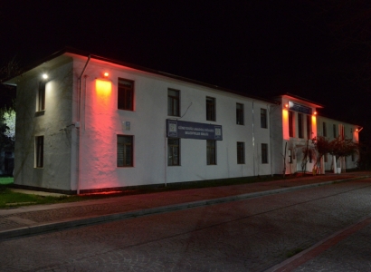 Red lights lit up for equal living
