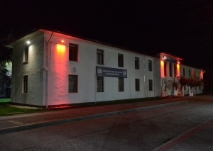 Red lights lit up for equal living
